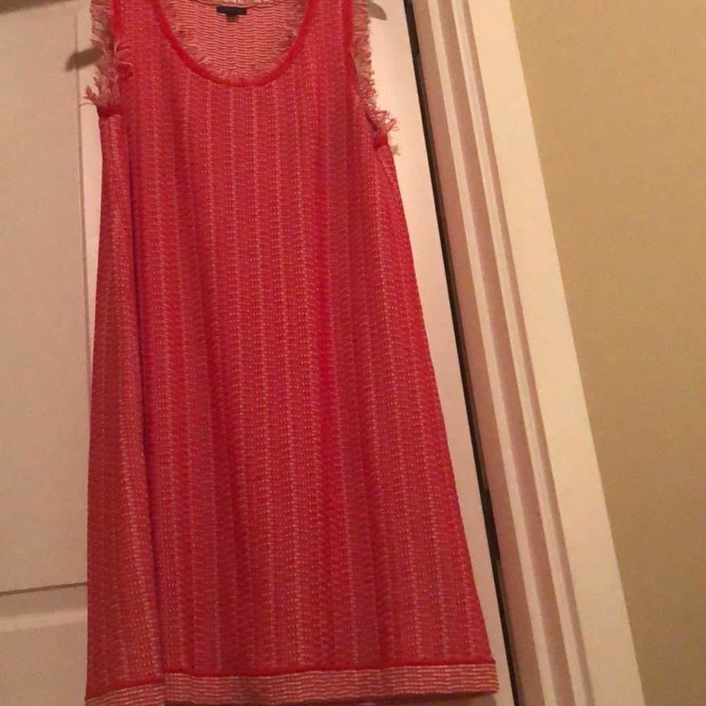 Sleeveless multi-colored knit sheath dress.
